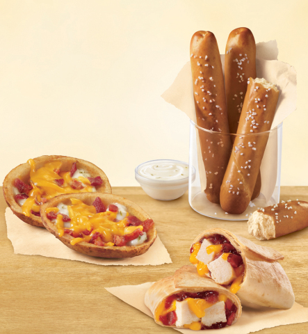 The DQ system introduces new DQ Bakes!® Snacks Menu with soft pretzels with zesty queso, potato skins and snack melts – all offered under $2 for a limited time at participating locations. (Photo: Business Wire)