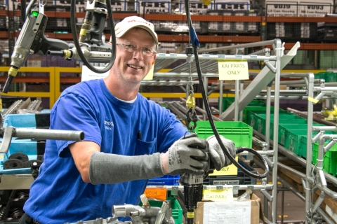 Marc Rumer works on the six-cylinder engine final assembly line at Toyota West Virginia. Rumer has been a team member at the Buffalo plant since 2000. (Photo: Business Wire)