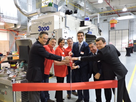 Ribbon Cutting Ceremony at Dow’s Ringwood, Ill. Pack Studios. Pictured; Diego Donoso, President Dow Packaging and Specialty Plastics; Jeff Huizenga, Lab Technician for Dow; Karen S. Carter, North America commercial vice president for Dow Packaging and Specialty Plastics; Bill Parks, Pilot Coater Facility Manager for Dow; Vincenzo Cerciello, Nordmeccanica N.A. president; Giancarlo Caimmi, Commercial Director for Nordmeccanica; Laurent Remy, Global Business Director, Adhesives and Functional Materials, Dow Packaging and Specialty Plastics. Photo Credit: Dow Packaging and Specialty Plastics  