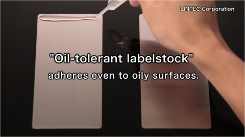 Oil-tolerant labelstock adheres even to oily surfaces (Photo: Business Wire)