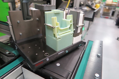A 3D printed jig, produced using a Stratasys Objet Connex 3D Printer, enables quick functional tests and required design iterations on the production line (Photo: Business Wire).