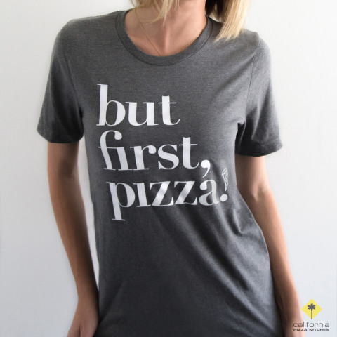 In honor of National Pizza Month, superfans can eat their pizza and wear it, too. Visit CPK.com to purchase custom graphic tees: “Slice, Slice Baby,” “Pizza Made Me Do It,” “But First, Pizza!” and “Pizza. The Answer Is Pizza.” (Photo: California Pizza Kitchen)