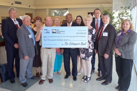 Regional elected officials joined representatives from The Cottonport Bank, FHLB Dallas, Avoyelles Society for the Developmentally Disabled (ASDD) and others at a check presentation today in Marksville, Louisiana. ASDD received $10,000 in Partnership Grant Program funds from The Cottonport Bank and FHLB Dallas. (Photo: Business Wire)