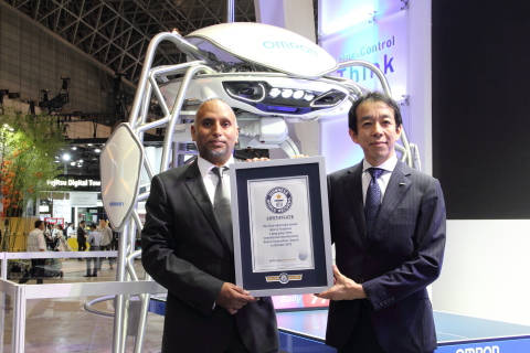 OMRON Corporation held a Guinness World Record certification ceremony for the Omron table tennis robot FORPHEUS, certified as the first robot table tennis tutor by Guinness World Records, at CEATEC JAPAN 2016 on October 3, 2016. (Photo: Business Wire)