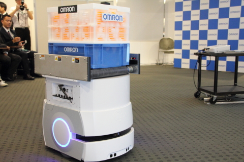 Omron's Mobile Robot LD is a carrier robot equipped with proprietary AI technology, which allows it to transport materials to a target location while calculating the optimal route and avoiding humans and obstacles. (Photo: Business Wire)