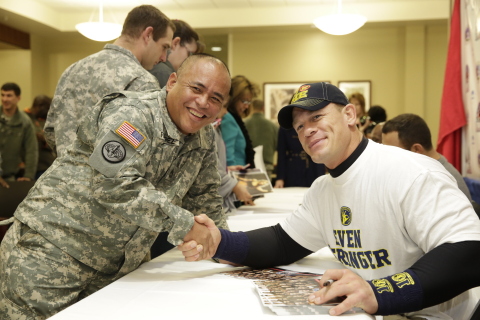 WWE Superstar John Cena greets our nation's troops. (Photo: Business Wire)