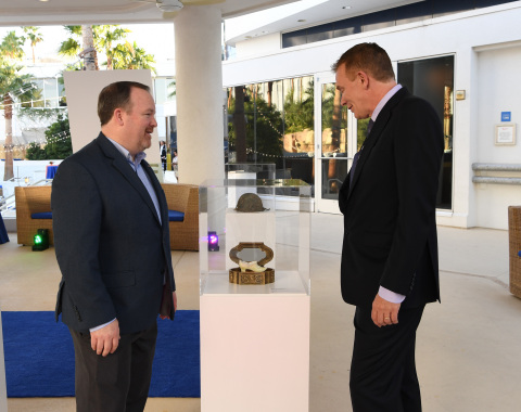 Hilton vice president of marketing Andrew Flack discusses WowMakers initiative with honoree Joe Landers at the Hilton Museum of Wow exhibit on Oct. 18, 2016 at the Hilton Tropicana Hotel in Las Vegas. (Denise Truscello /Getty Images for Hilton)