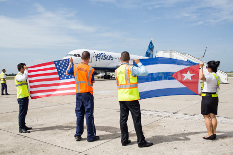 Crewmembers at the Santa Clara Abel Santamaría International Airport in Cuba welcome JetBlue flight 387 on Wednesday, August 31, 2016, the first commercial flight to Cuba from the U.S. in more than 50 years. (Photo: Business Wire)