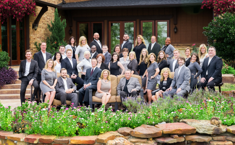 Russell Rhodes (front row, third from left) and The Rhodes Team have joined Berkshire Hathaway HomeServices PenFed Realty Texas. (Photo: Business Wire) 