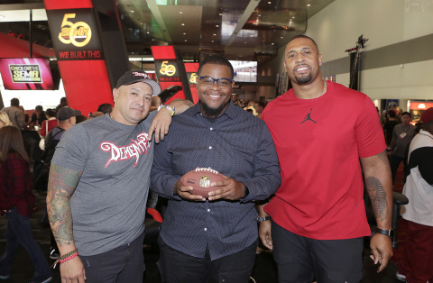 NFL Network debuts new reality series "Tackle My Ride," starring Super Bowl Champion LaMarr Woodley, right, and Demented Customs master car builder, James Torrez, left, with featured Cleveland fan, Joe Whitthorne, at 2016 SEMA Show in Las Vegas Wednesday, Nov. 2, 2016. (Photo: Business Wire)