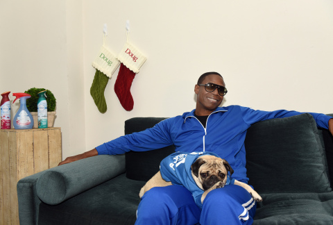 In this image distributed Thursday, Nov. 10, 2016 for Febreze, beatboxer Doug E. Fresh and Instagram star @ItsDougThePug pose on the New York set of their music video for the hip-hop remix of Febreze’s second annual "The #12Stinks of Christmas.” Following the success of last year’s “The #12Stinks of Christmas” music video, this funky fresh remix is available now on YouTube.com/Febreze. (Photo by Diane Bondareff/Invision for Febreze/AP Images)