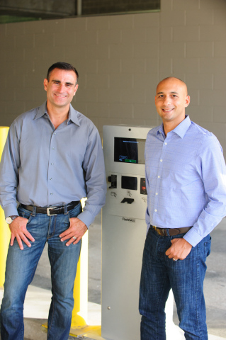 President Sam Goodner and CEO/co-founder Juan Rodriguez stand in front of Klever Logic's gated garage solution. (Photo: Max Photography)