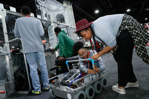 FIRST Robotics Competition Team 120, “Cleveland’s Team”, working on their robot at Automation Fair®(Photo: Business Wire)