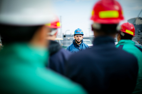 Supervisor Alfredo Dajer, graduate of the Philly Shipyard Apprentice Program, speaks to a group of students about career development opportunities from apprenticeship programs. Photo credit: Charles Cerrone Photography