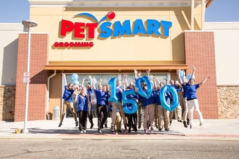 PetSmart associates in Sheridan, Colo., celebrate the 1,500th store to open in North America. The store, one of approximately 80 new stores the pet specialty retailer is opening this year, opened its doors this week. (Kim Cook/AP Images for PetSmart, Inc.)