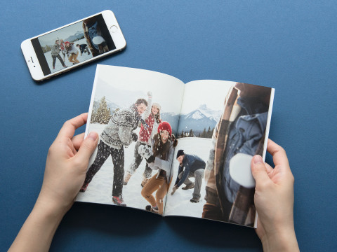 TOLOT's high-quality photobooks made from smartphone photos will be available at the low price of $5.99. (Photo: Business Wire)