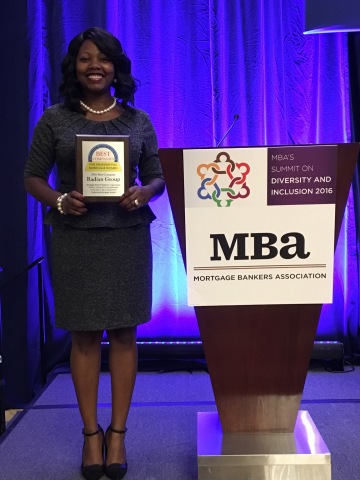 MJ Watkins, Multicultural Business Manager, Asian & African American Segments, receives the Best Company for Professional Women Award on behalf of Radian. (Photo: Business Wire)