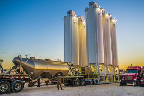 The Solaris Mobile Sand Silo System at work in the Permian Basin. This standard six-silo configuration provides 2.5 million pounds of well-site proppant. (Photo: Business Wire)