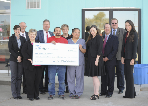 Representatives from FirstBank Southwest and FHLB Dallas joined Rivers Laundromat owner Raul Rios at a check presentation and ribbon-cutting ceremony today in Pampa, Texas. Rivers Laundromat received a $7,500 small business grant from the two banks. (Photo: Business Wire)