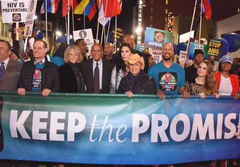 Harry Belafonte (center left, in necktie) and family joined (L to R) marchers Michael Weinstein, AHF President; Pamela Belafonte, Shari Belafonte; recording artists Common and JoJo and Karen Civil for an inspirational moment at  AIDS Healthcare Foundation’s ‘Keep the Promise’ March in Hollywood, CA on November 30, 2016. More than a thousand people marched down historic Hollywood Boulevard on the eve of World AIDS Day to raise awareness about HIV/AIDS and to persuade key decision makers in the U.S. and around the globe to commit more resources and funding to HIV/AIDS prevention, care and treatment. A free Keep the Promise concert at the Dolby Theatre headlined by Patti LaBelle and Common and honoring Belafonte for his lifetime of humanitarian and charitable work followed the march. (Araya Diaz/Getty Images for AIDS Healthcare Foundation)