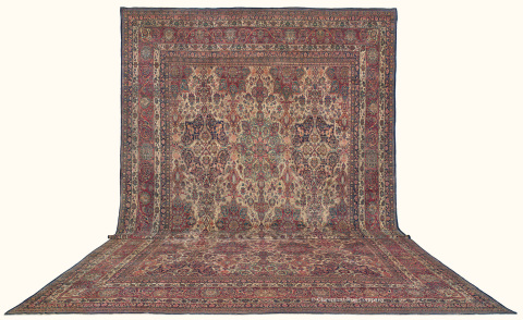 The 170-year-old palace-size (15x25) Persian Laver Kirman rug likely took a team of 10 master weavers more than five years to complete, using over 15 million hand-woven knots. (Photo courtesy of Claremont Rug Company)