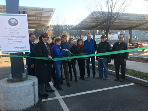 Town of Wayland officials, representatives from DOER Green Communities and MAPC, and Ameresco celebrate completion of solar facilities in Wayland with a ribbon-cutting event.