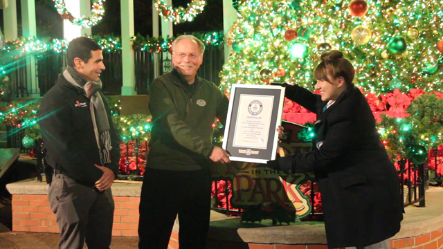 Couples Pucker Up at Six Flags Parks to Break Guinness World Record for Most couples kissing under the mistletoe at multiple locations