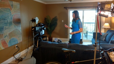 Wink News anchor and reporter Lindsey Sablan preparing for interview in the home of national child guardian and SubscriberWise president David Howe (Photo: Business Wire)