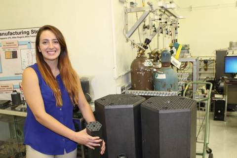 Massachusetts Institute of Technology student Briana Hiscox spent her summer at Oak Ridge National Laboratory in the Nuclear Engineering Science Laboratory Synthesis program studying accident-tolerant nuclear fuels, or fuels designed to minimize the likelihood of nuclear overheating and meltdown. Hiscox, pictured here with prismatic fuel element blocks, hopes to return to the lab as a full time employee after she obtains her doctorate degree in nuclear engineering. (Photo: Business Wire)