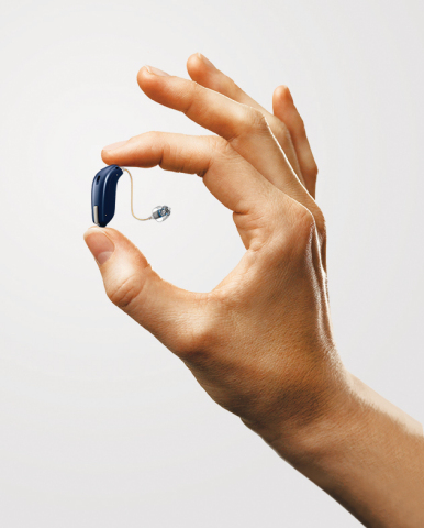 Oticon Opn™, the world's 1st hearing aid that connects to and interacts with the Internet via the IFTTT Network, will be showcased at 2017 CES and 2017 CES Unveiled Las Vegas. Winner of two 2017 CES Innovations Awards for Wearable Technology and Tech for a Better World, the small, discreet hearing aid can be programmed to talk directly with doorbells, smoke detectors & other smart devices via the Oticon ON App. (Photo: Business Wire)
