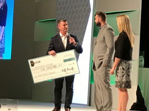 Jeff Acuff, Senior Vice President US Sales, Bioventus Active Healing Therapies, Presents $10,000 Check to Gregory Gudenkauf and Christine Blankmeyer of Opportunity Village (Photo: Business Wire)