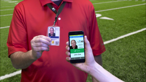 The SureID mobile app will instantly confirm that the coach or volunteer is active and will display the coach’s or volunteer’s photo. (Photo: Business Wire)