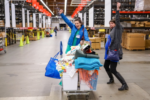 IKEA Renton donation day recipients celebrate their shopping spree at the old Seattle-area store. (Photo: Business Wire)