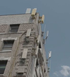 WHO's International Agency for Research on Cancer calls the radiation emitted by telecommunications antennas a Group 2B 'Possible Carcinogen,' but antennas keep going up on residential buildings, benefiting owners while risking the health of residents. (Photo: Business Wire)