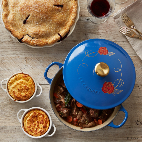 Created in honor of Disney's live-action adaptation of Beauty and the Beast, this vibrant blue-enameled soup pot by Le Creuset casts an enchanting spell over the kitchen. Featuring an iconic red rose design and a golden knob engraved with "Be Our Guest," this special-edition piece is available in limited quantities. (Photo: Business Wire)