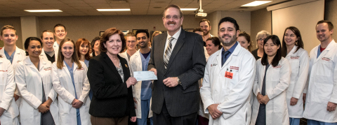 Pictured above in the foreground left to right: Dr. Theresa G. Mayfield, Assoc. Dean for Clinical Affairs at U of L School of Dentistry; Dr. Jerry W. Caudill, Avēsis KY State Dental Director; Dr. Hector R. Martinez, Vice-Chair of the Orthodontics, Pediatric Dentistry and Special Care Department. Pictured in the background are some of the dental students and faculty from UofL who participated in the event. Photo courtesy: UofL