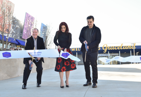 From left to right: Elvis Presley Enterprses CEO Jack Soden, Priscilla Presley and Graceland Holdings LLC Managing Partner Joel Weinshanker cut the ribbon to open the new Elvis Presley's Memphis Entertainment Complex at Graceland. (Photo: Business Wire)