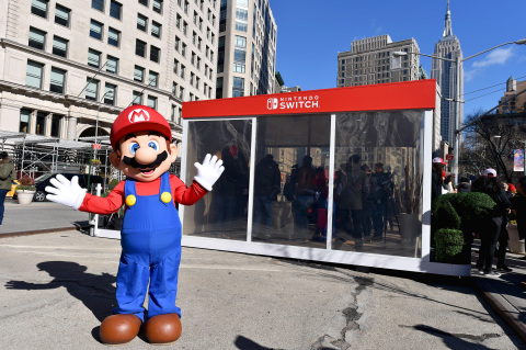In this photo provided by Nintendo of America, Mario makes a guest appearance at the Nintendo Switch in Unexpected Places activation at Madison Square Park in New York. The new Nintendo Switch home gaming system is available worldwide now. (Photo: Nintendo of America)