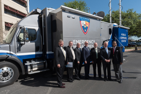 From Left to Right Port Houston Executive Director Roger Guenther, Port Commissioners Stephen DonCarlos, John D. Kennedy, Dean Corgey, Roy Mease, Clyde Fitzgerald and Theldon Branch stand in front of Port Houston’s new Mobile Command Center. (Photo: Business Wire)