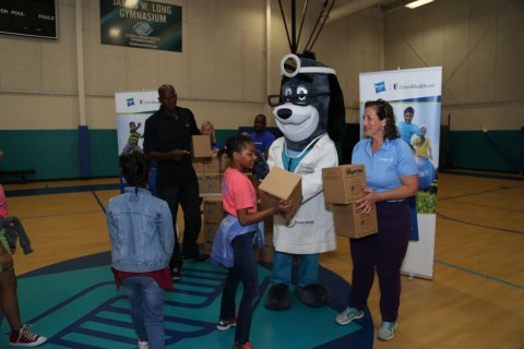 Dr. Eina Fishman, chief medical officer, UnitedHealthcare Community Plan of Florida, and Bo Outlaw, community ambassador and former player for the Orlando Magic, passed out 150 NERF ENERGY Game Kits to members of the Boys & Girls Clubs of Central Florida. The kids were led through exercises and basketball drills to test out their new NERF ENERGY Game Kit that tracks activity earning "energy points" in order to play the game. The donation is part of a recently launched national initiative between Hasbro and UnitedHealthcare, featuring Hasbro's NERF products, that encourages young people to become more active through "exergaming." Outlaw donated 150 basketballs through the Orlando Magic Youth Basketball Academy this afternoon to the Walt Disney World Club House (Photo: Chris Favis).