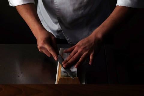Chef using the Kamikoto Toishi Sharpening Whetstone (Photo: Business Wire)