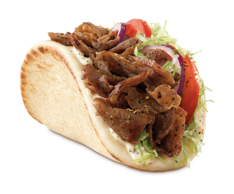 Arby's Traditional Greek Gyro features a blend of beef, lamb and Mediterranean spices sliced from a spit rotisserie and placed on a warm flatbread with lettuce, tomatoes, red onions, tzatziki sauce and Greek seasoning. (Photo: Business Wire)
