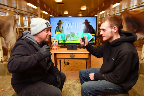 In this photo provided by Nintendo of America, gamers from Nintendo go head to head against real dairy farmers to see whose cow-milking skills reign victorious in Milk, one of 28 fun games in the 1-2-Switch game for the Nintendo Switch system. Players enjoyed several friendly matches in various locations throughout Billings Farm & Museum in Woodstock, Vermont, on March 29. 1-2-Switch and the Nintendo Switch system are now available worldwide. (Photo: Business Wire) 