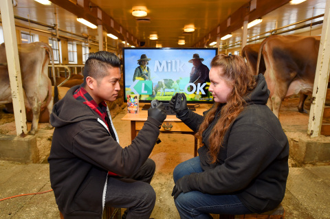 In this photo provided by Nintendo of America, gamers from Nintendo go head to head against real dairy farmers to see whose cow-milking skills reign victorious in Milk, one of 28 fun games in the 1-2-Switch game for the Nintendo Switch system. Players enjoyed several friendly matches in various locations throughout Billings Farm & Museum in Woodstock, Vermont, on March 29. 1-2-Switch and the Nintendo Switch system are now available worldwide. (Photo: Business Wire)