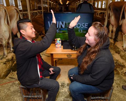 In this photo provided by Nintendo of America, gamers from Nintendo grabbed victory by the udder in a head-to-head challenge in Milk, one of 28 games in 1-2-Switch. The game, which uses the Nintendo Switch Joy-Con controllers to let players compete in fun and outrageous activities, launched worldwide alongside Nintendo Switch on March 3. (Photo: Business Wire)