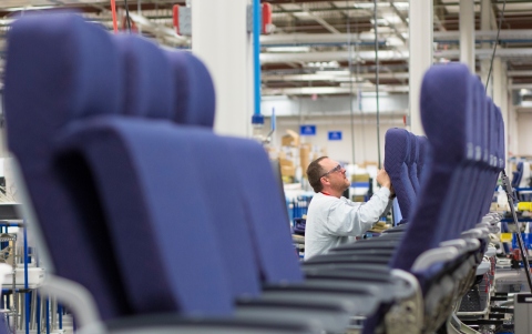 An employee from Rockwell Collins' new Interior Systems business building airline cabin seats at its Winston-Salem, North Carolina-based facility. (Photo: Business Wire)