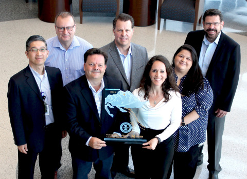 For the fifth consecutive year, Mouser Electronics has received the NorthFace ScoreBoard Award from Omega Management Group Corp. for world-class customer service excellence. Pictured left to right in back are Mouser executives Minky Lam, Graham Munson, Coby Kleinjan, Linda Salinas, Mauro Salomao. In front holding trophy are Mark Burr-Lonnon and Stephanie Sorrell. (Photo: Business Wire)