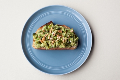 Smashed California Avocado Tartine with Charred Green Garlic and Roasted Poblano by Chef Sam Goinsalvos of Tartine Manufactory (Photo: Business Wire)