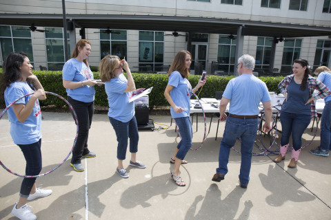 Rent-A-Center coworkers ditched their business attire in lieu of T-shirts today as part of their month-long North Texas Food Bank campaign. (Photo: Business Wire)