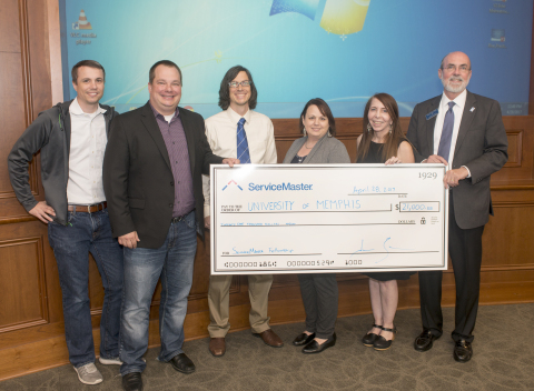 Jamie Smith, CIO of ServiceMaster, and leaders from his Customer Experience team, present the first of two anthropology scholarship grants to Tom Nenon, Dean of the College of Arts & Sciences at the University of Memphis. (Photo: Business Wire)